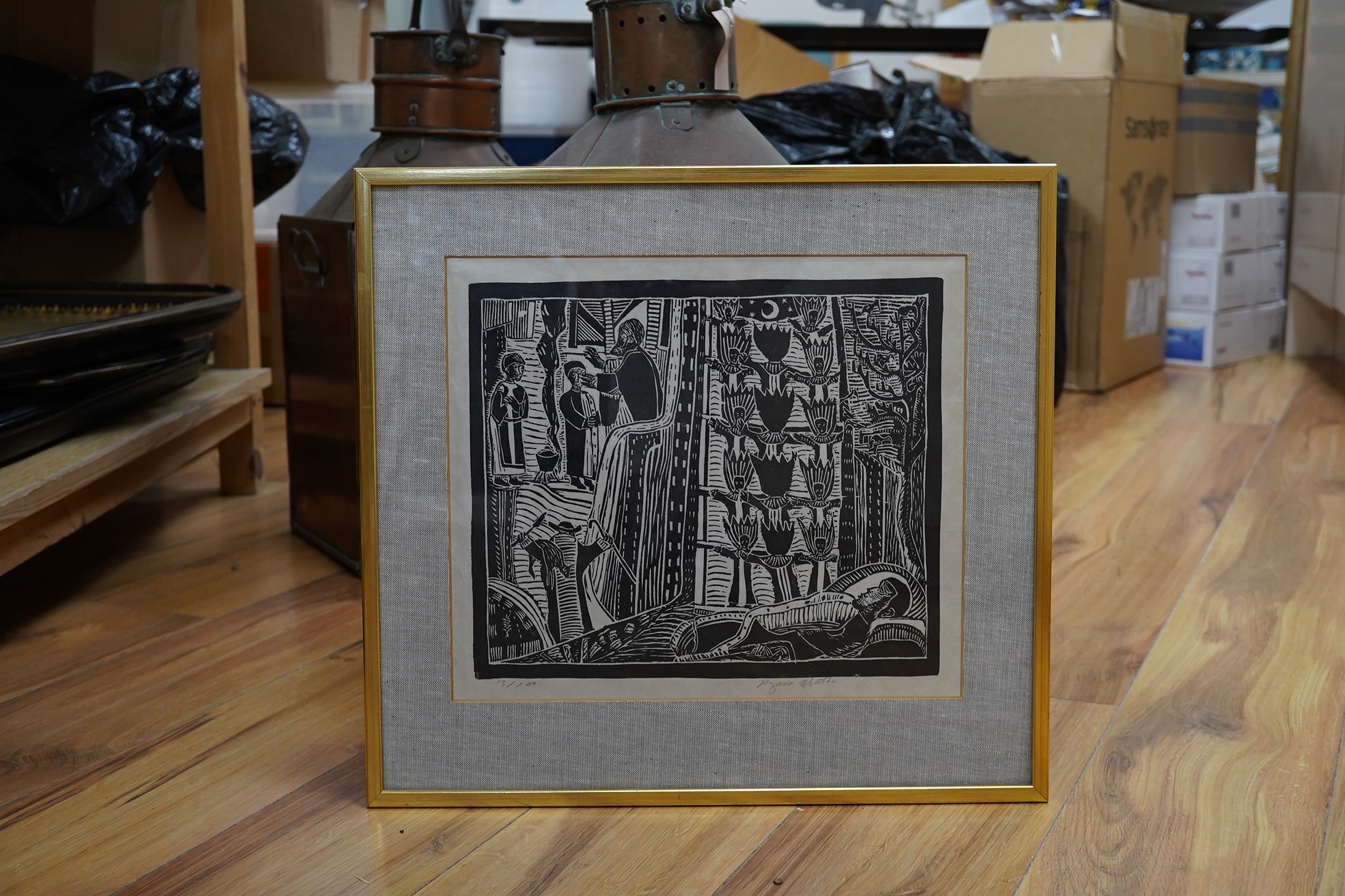 Azaria Mbatha (African, b.1941), wood block print, Surreal composition tribal figures, signed in pencil, limited edition 13/100, 28 x 33cm. Condition - fair to good